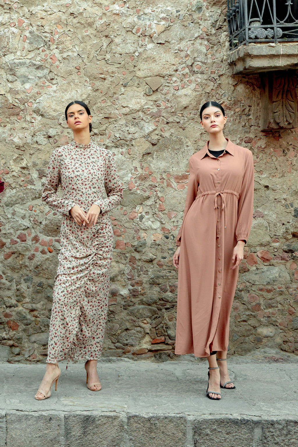 Two women in beige button-down drawstring maxi dresses