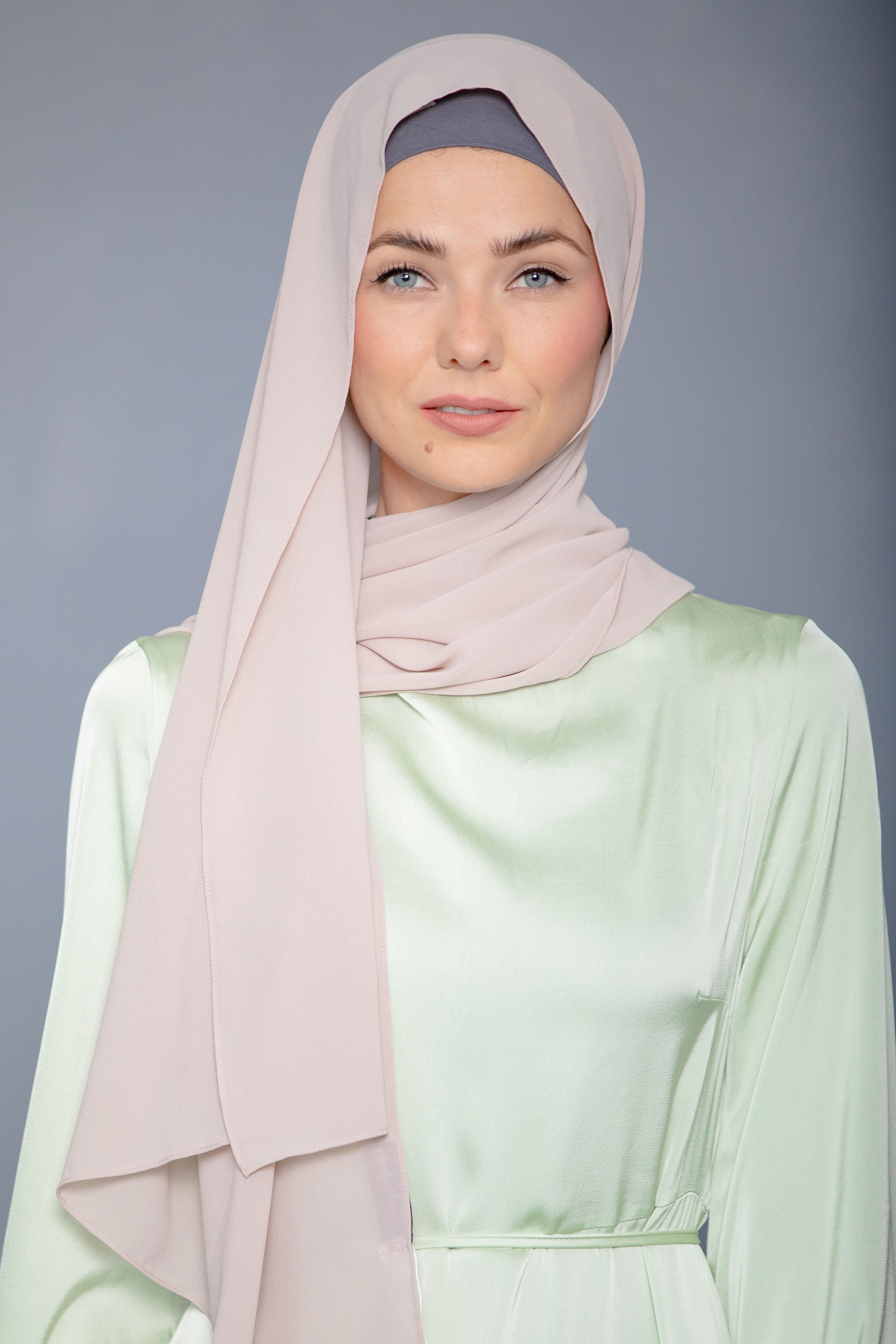 Woman in Latte Chiffon Hijab and Satin Dress