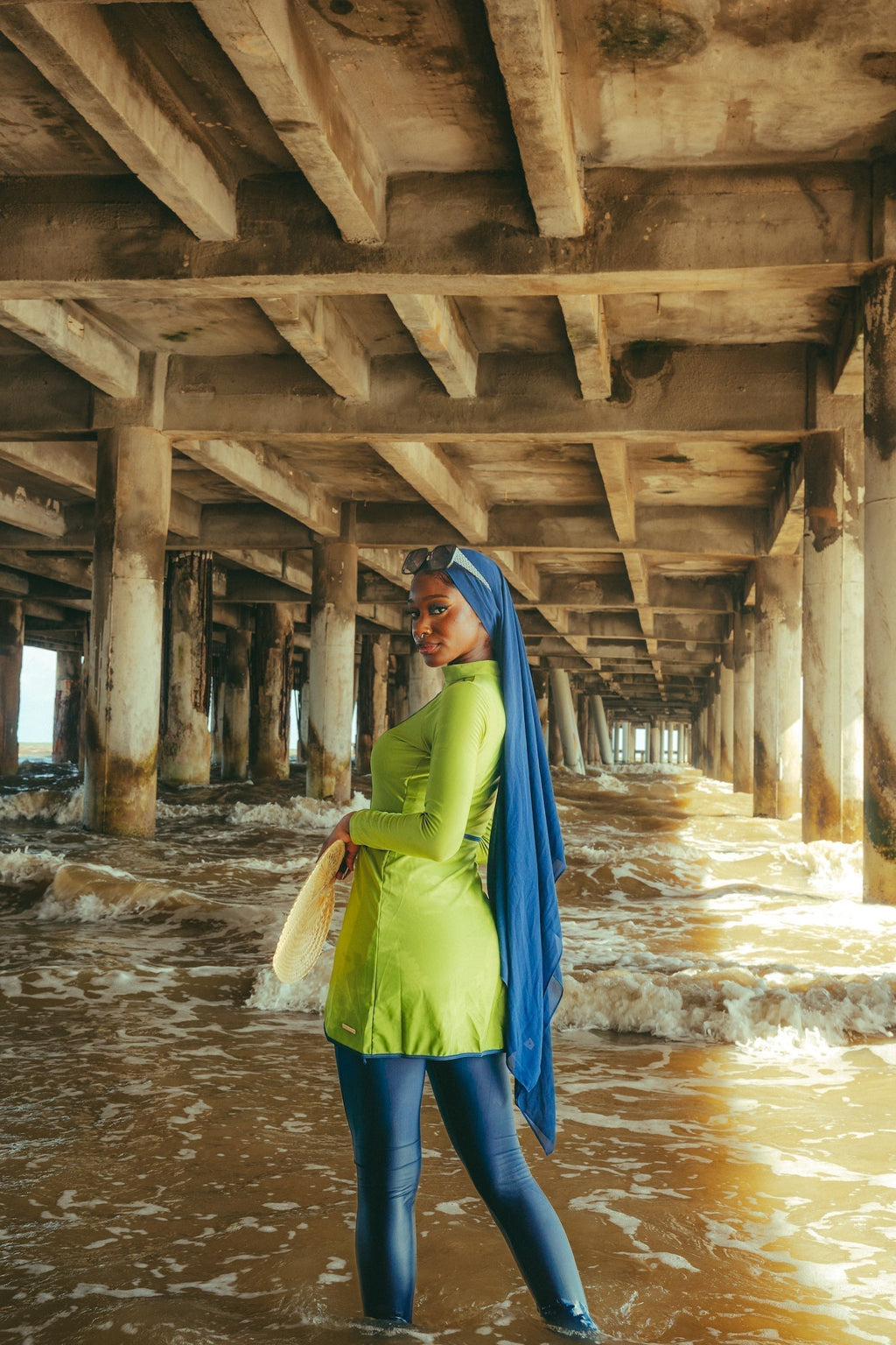 Lime Green 3 Piece Modest Swimsuit under pier